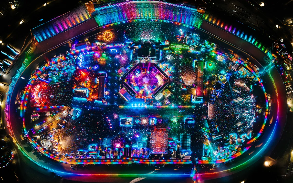 An aerial view of the illuminated EDC Las Vegas festival grounds